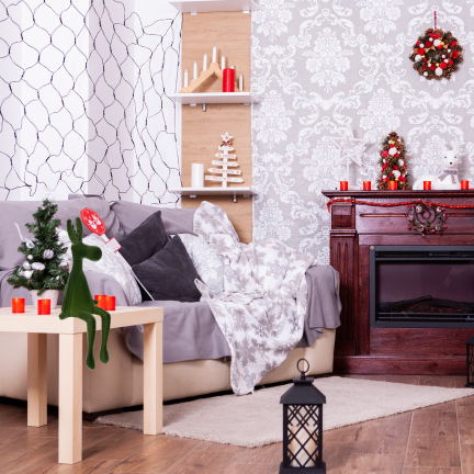 TG83729-8 – Flockiertes sitzendes Rentier als Weihnachtsdekoration